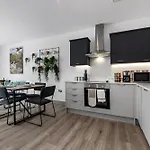 Earthy Elegance: Nature Inspired Flat In Prime Location